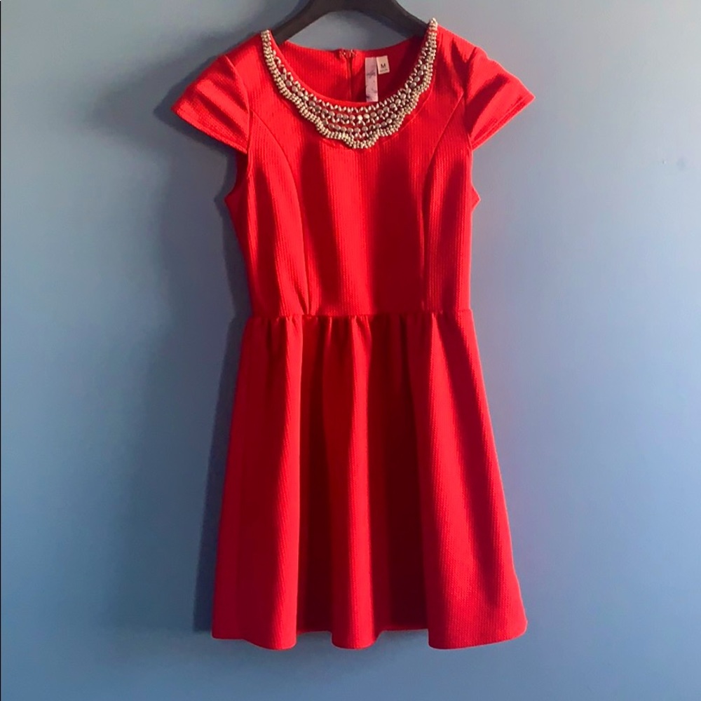 Red short sleeve dress with embellishments